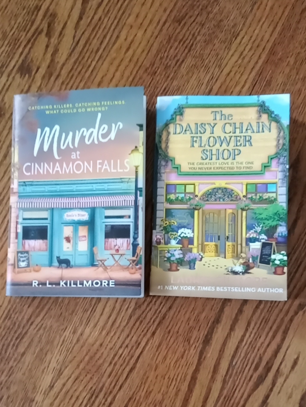 Two Soft Cover Books-Murder at Cinnamon Falls & The Daisy Chain Flower Shop